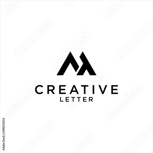 abstract MT logo design. TM letter with black geometric logotype photo