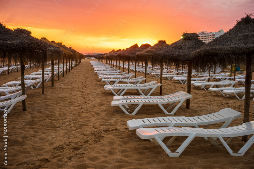 Obraz premium Beautiful colorful sunset on the beach in Vilamoura, Algarve, Portugal