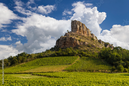 Rock of Solutre with vineyards, Burgundy, Solutre-Pouilly, France photo