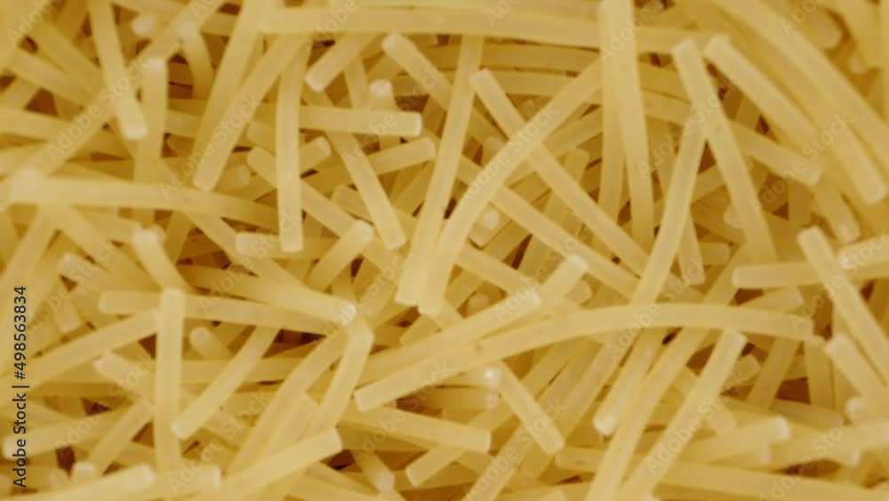 I take out noodles, pasta from the jar with my hand, top view. Dolly slider extreme close-up inside. Laowa Probe I take out noodles, pasta from the jar with my hand, top view. Dolly slider extreme close-up inside. Laowa Probe