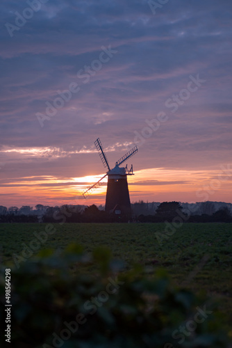 Vertical shot of a Halnaker Windmill during a sunset photo