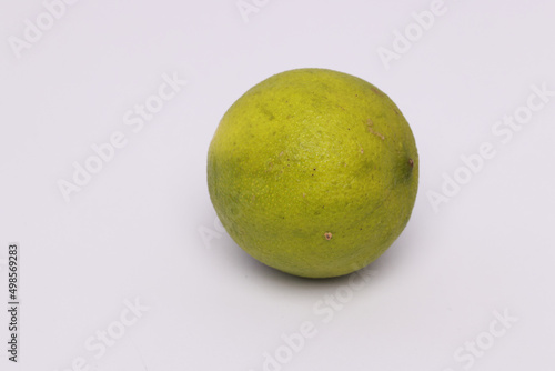 Closeup of a green lime isolated on a white background with copyspace
