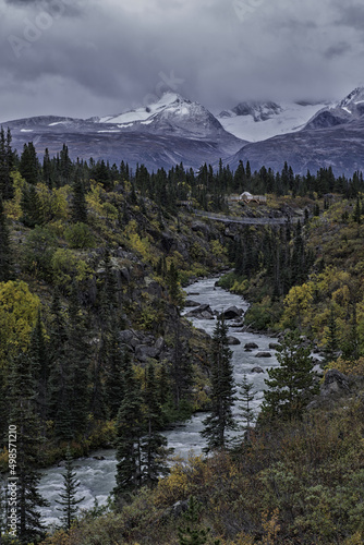 фотографія Tutshi river fall colors with footbridge Northern British Columbia, Canada