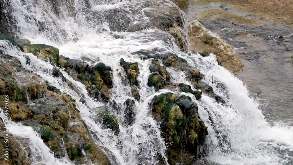 Fall Creek Falls flowing into the Snake River moving in slow motion in Idaho. Fall Creek Falls flowing into the Snake River moving in slow motion in Idaho.