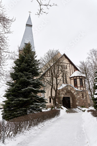 The Church of the Holy cross at winter in Riga, Latvia photo