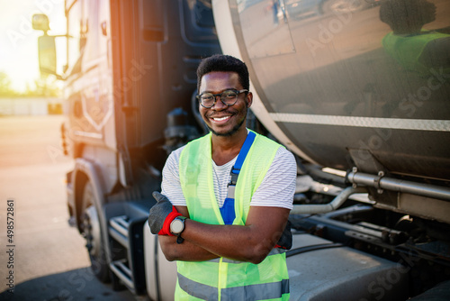 Fotografie Portrait of handsome young African American man working in towing service on the road