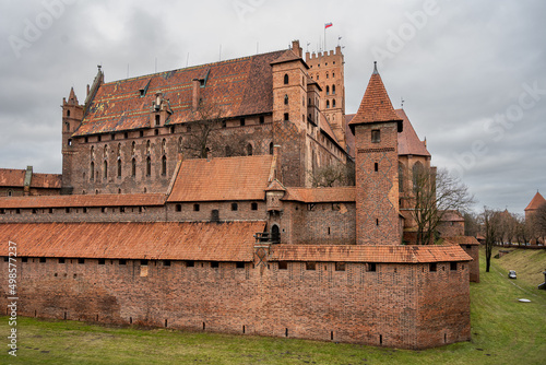 The medieval Castle of the Teutonic Order in Malbork in the Pomerania region, Poland. This is the largest castle in the world measured by land area and a UNESCO World Heritage Site