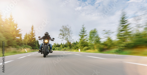 Fotografija motorbike chopper on the road riding. having fun driving the emp