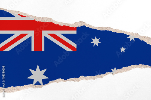 Ripped paper background in colors of national flag. Australia photo