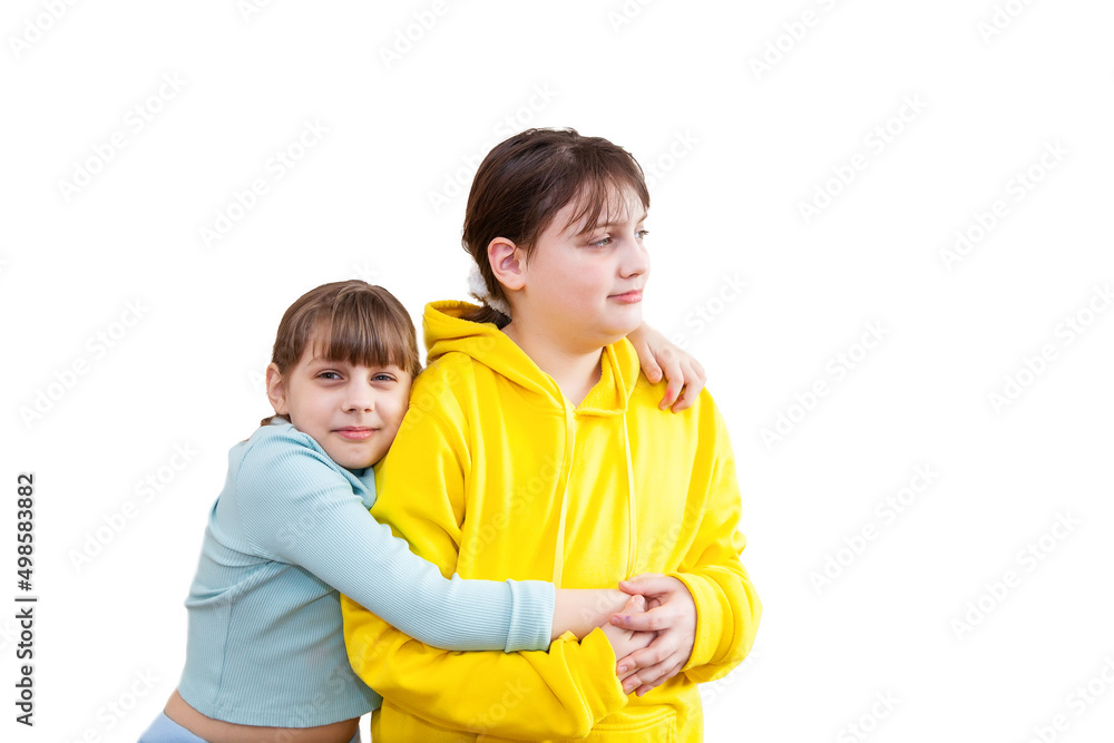 Two sisters hugging and having fun in studio on white background. age difference Two sisters hugging and having fun in studio on white background. age difference