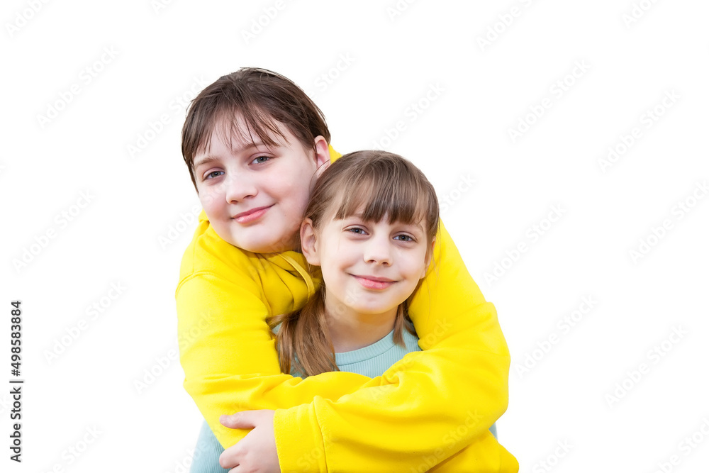 Two sisters hugging and having fun in studio on white background. age difference Two sisters hugging and having fun in studio on white background. age difference
