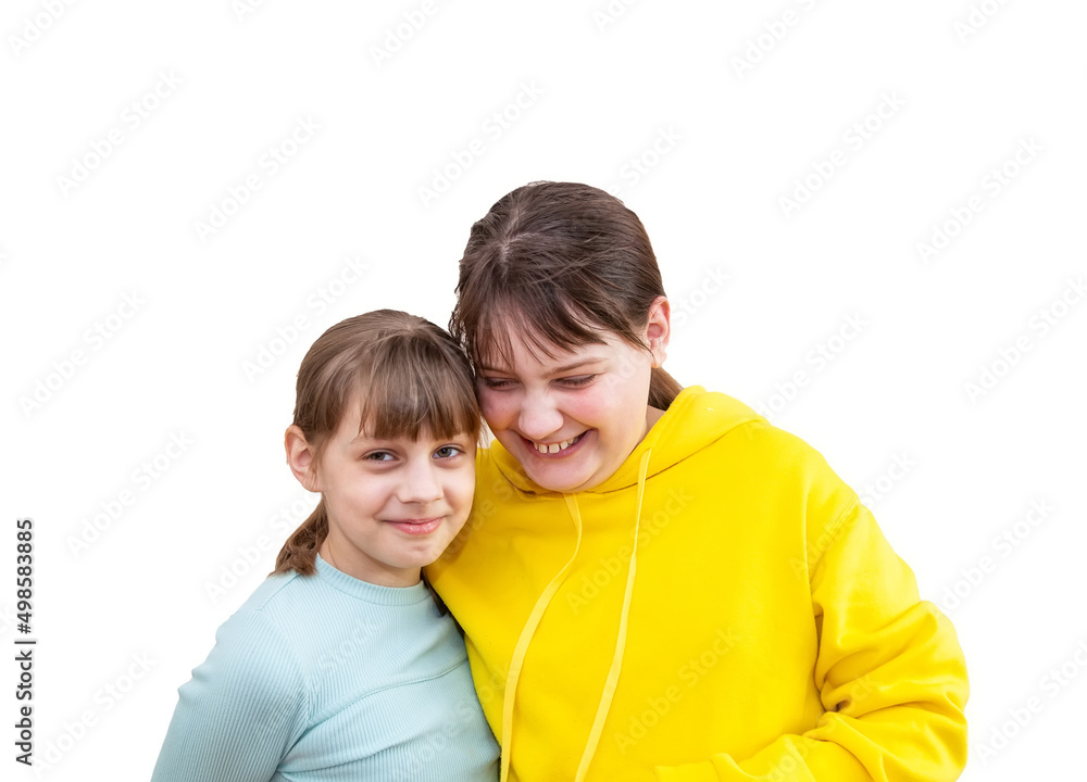 Two sisters hugging and having fun in studio on white background. age difference Two sisters hugging and having fun in studio on white background. age difference