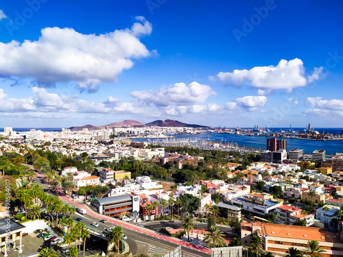 Aerial view of a cityscape next to the sea in the daytime. photo