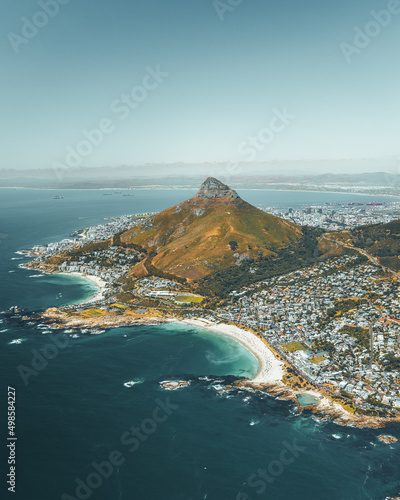 Aerial shot of the coast of Cape Town, South Africa and Signal Hill photo