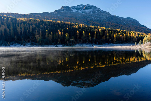 Beautiful view in autumn on Lake of Staz and its reflection in the upper Engadine
