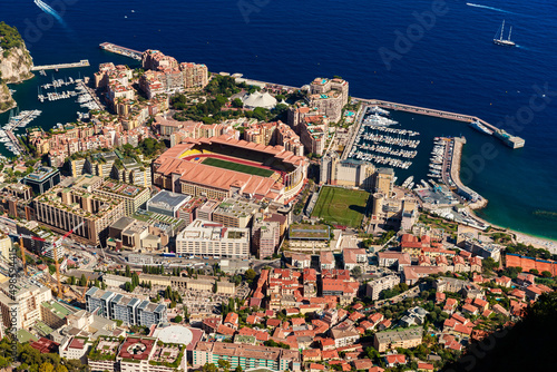 Aerial view of port Cap Dail at sunset, France, a lot of boats are moored in marina, view of city life from La Turbie mountain, mega yachts