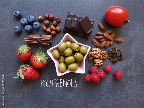 Foods high in polyphenols. Natural sources of polyphenols: blueberry, raspberry, nuts, clove, chocolate, cinnamon. Polyphenols are compounds with antioxidant properties, offers various health benefits photo