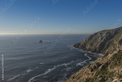 Scenic view of the Cape Finisterre on a sunny day photo