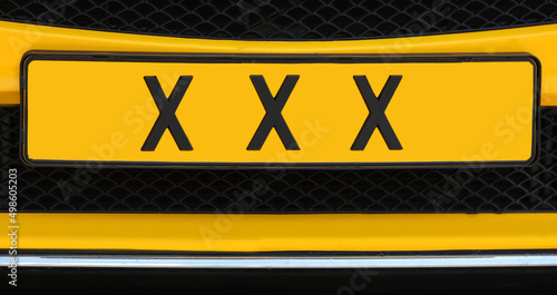 car with the text three Xs which are the symbol of the city of Amsterdam