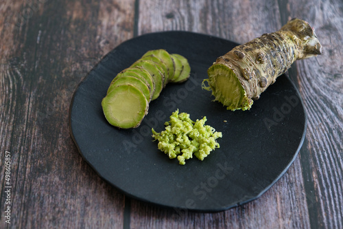 Canvas Print Plate of Japanese horseradish or wasabi on a wooden table