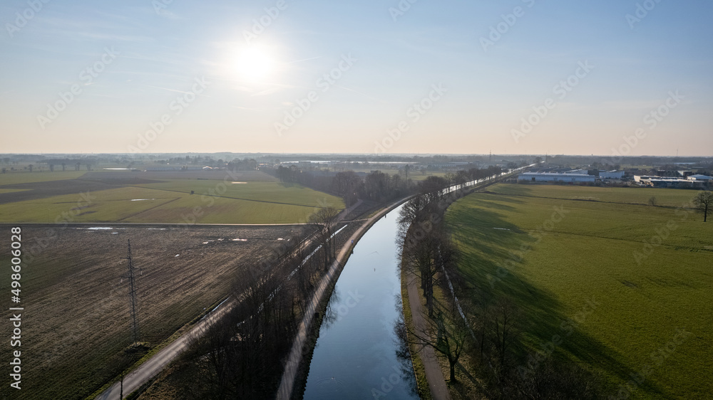 Fototapeta premium canal Dessel Schoten aerial photo in Rijkevorsel, kempen, Belgium, showing the waterway in the natural green agricultural landscape. High quality photo. High quality photo