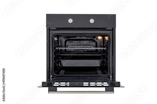 Black oven with open door and three trays, with two control knobs