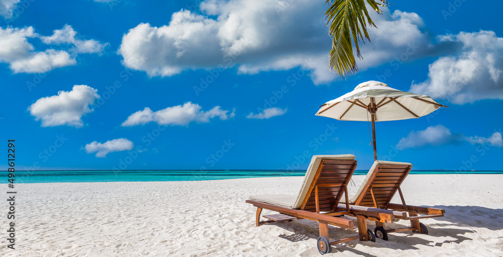 Beautiful tropical beach banner. White sand coco palm trees, couple chairs travel tourism wide panorama concept. Amazing beach landscape. Luxury island resort vacation holiday. Sunny paradise coast