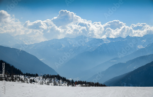 Breathtaking top view from ski trail to Val di Sole valley, Italy. Europe. Stelvio National Park, Trentino, Alps Italy.