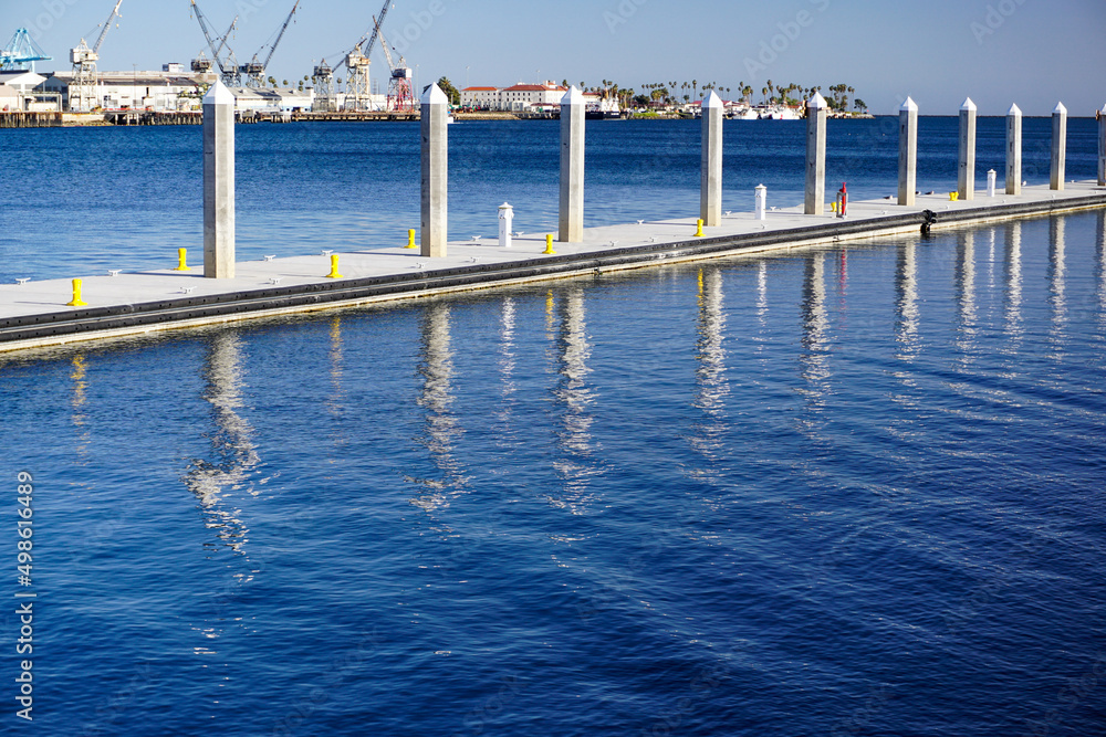 Modern floating dock with mooring cleats, bollards, other amenities, a new facility for boaters traveling the scenic Port of Los Angeles.