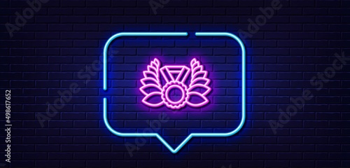 Neon light speech bubble. Laurel wreath line icon. Winner medal symbol. Prize award sign. Neon light background. Laureate medal glow line. Brick wall banner. Vector
