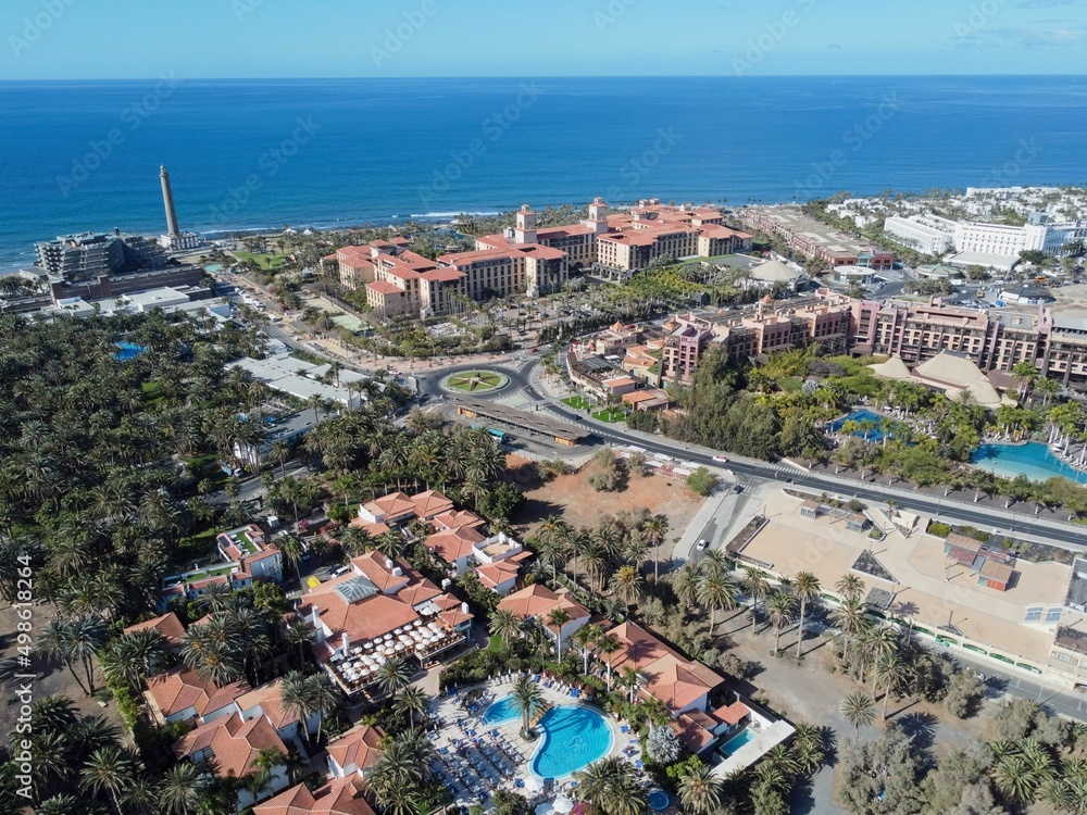 Aerial drone. Popular resort town of Meloneras, with hotels and restaurants, near the Maspalomas dunes in Gran Canaria, Canary Islands, Spain