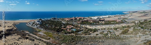 Aerial drone. Popular resort town of Meloneras, with hotels and restaurants, near the Maspalomas dunes in Gran Canaria, Canary Islands, Spain photo