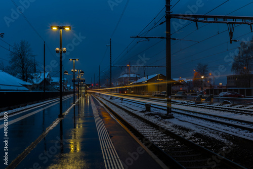 Very bad weather in Brunnen station in spring snowy morning © luzkovyvagon.cz