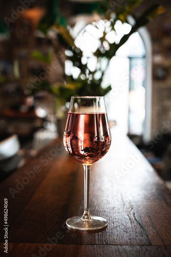 glass of rose wine in a bar