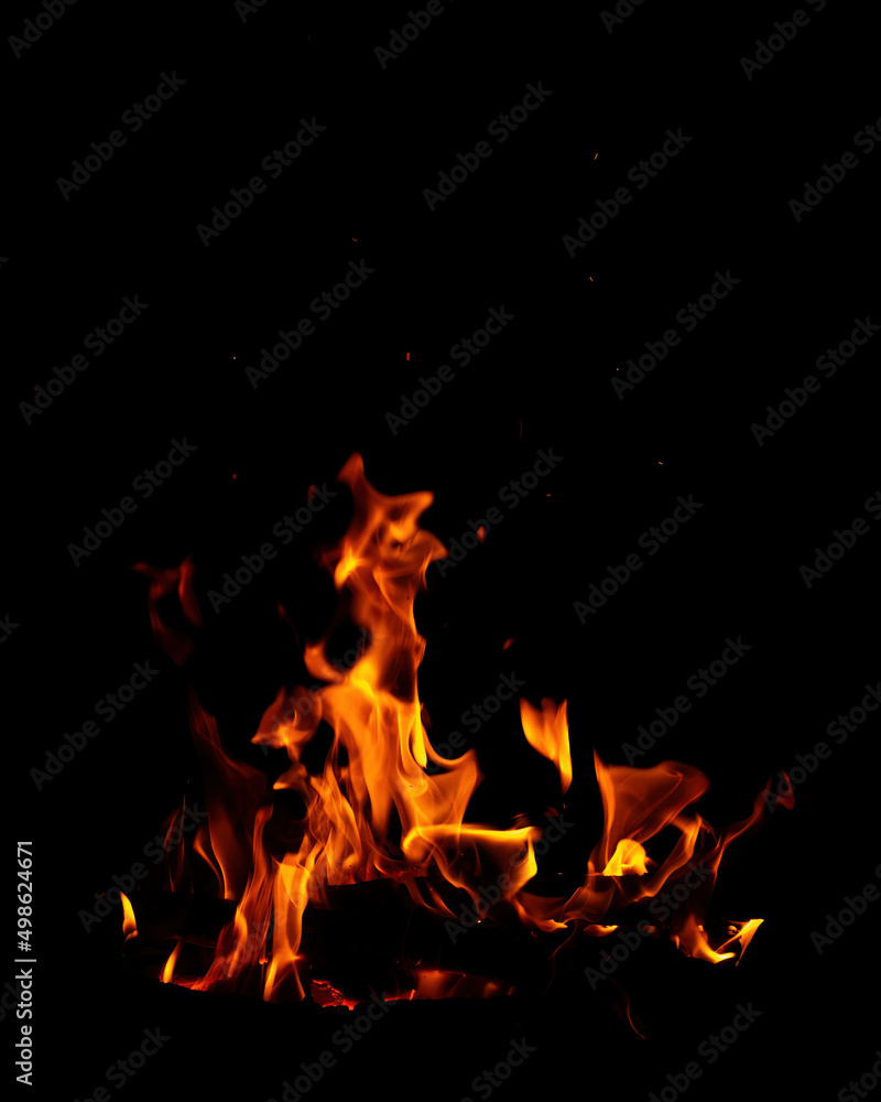 Obraz premium Abstract flame of fire from a campfire on a black background