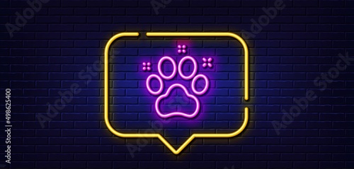 Neon light speech bubble. Pet friendly line icon. Dog paw sign. Hotel service symbol. Neon light background. Pet friendly glow line. Brick wall banner. Vector
