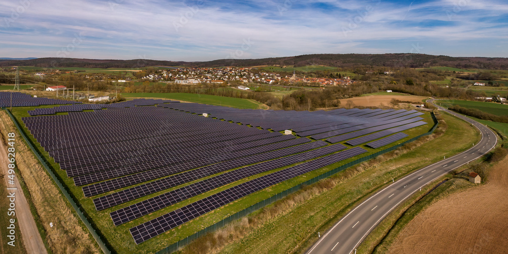 Solar Park Seßlach, Upper Franconia, Bavaria, Germany with town of Seßlach in the background