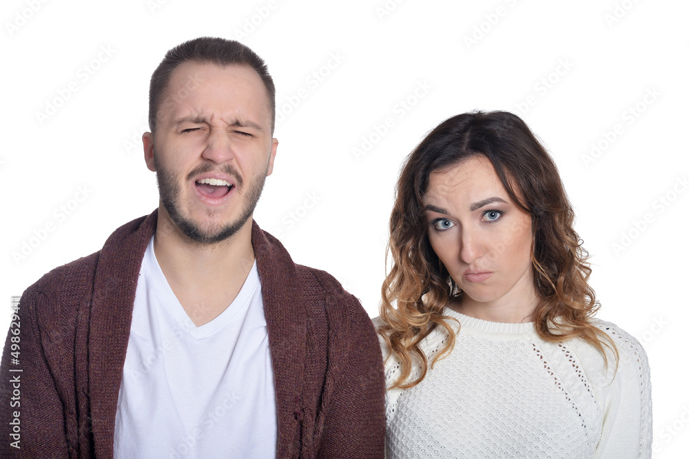 Portrait of beautiful woman and man making facial expressions Portrait of beautiful woman and man making facial expressions