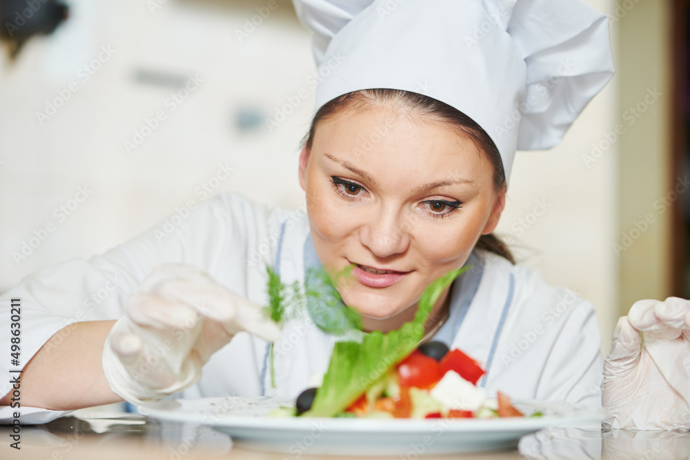 female cook chef decorating prepared salad food female cook chef decorating prepared salad food