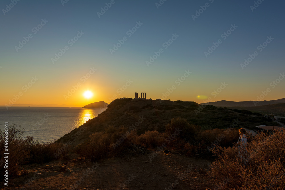 The ancient Temple of Poseidon during sunset at Sounio, Attica, Greece
