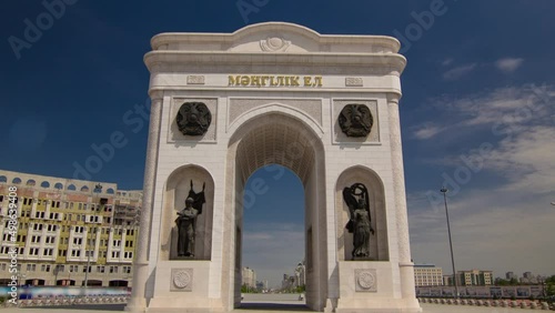 Triumphal arch timelapse hyperlapse and the central part of the city in Astana, Kazakhstan. photo