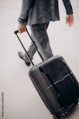 man with a suitcase at the airport
