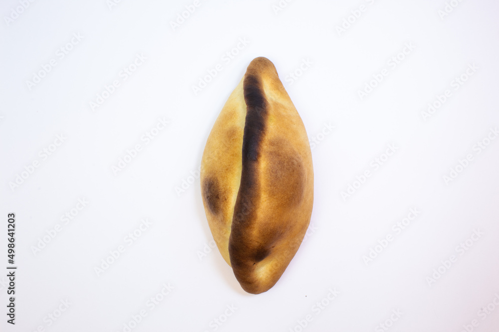 salteña, empanada with a juicy filling, Bolivian appetizer salteña, empanada with a juicy filling, Bolivian appetizer