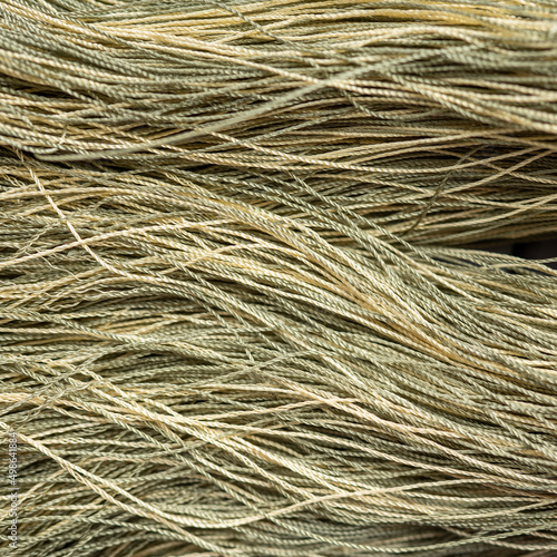 Texture of synthetic golden threads. High quality photo