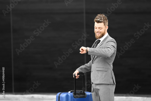 Young businessman with blue...