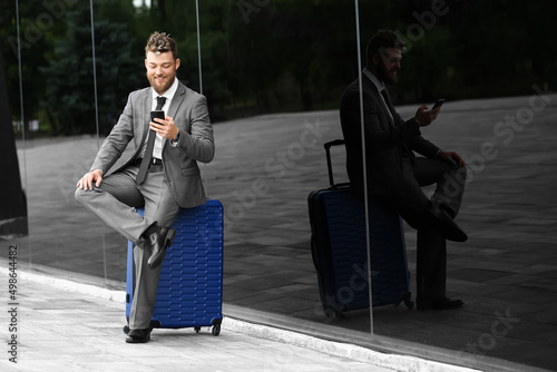 Young businessman with blue...