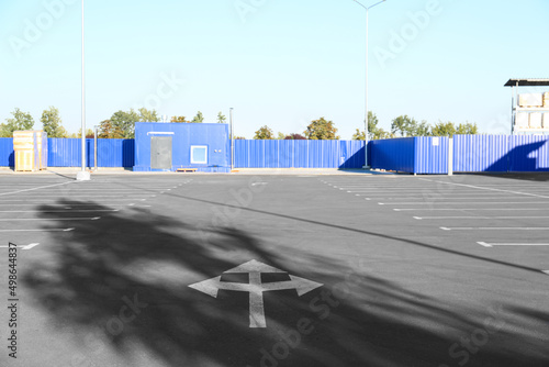 Empty parking lot on blue f...