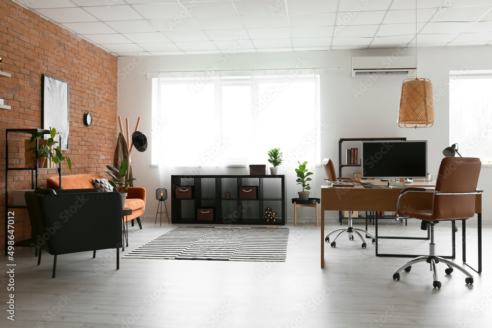Fototapeta premium Workplace with modern computer in light office interior