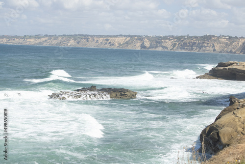 waves crashing on rocks