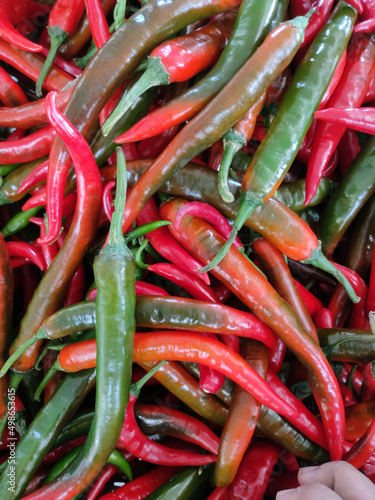 Top view large red chillies used in cooking and used as food garnishes.